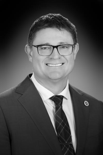 Commissioner Orion Godfrey blk and white