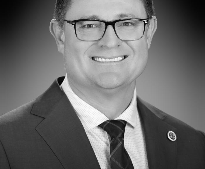 Commissioner Orion Godfrey blk and white